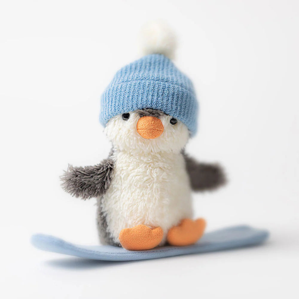 Pingouin Peanut en Planche à Neige
