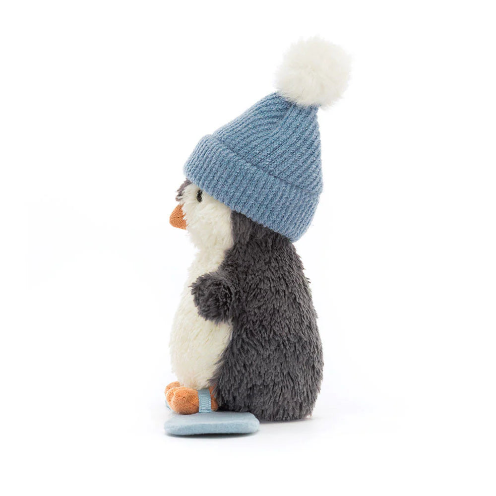 Pingouin Peanut en Planche à Neige